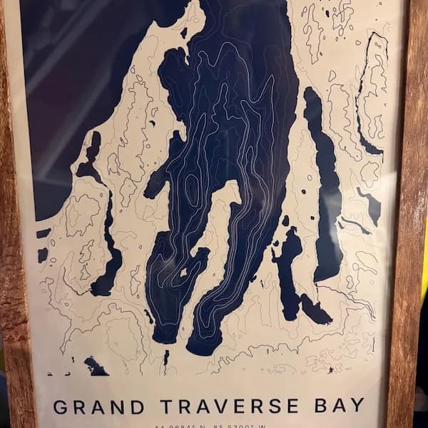 Framed Grand Traverse Bay lake map poster in navy and cream